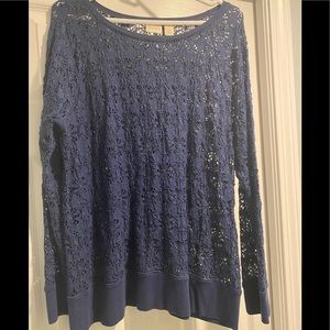 Navy blue top with cut out type pattern